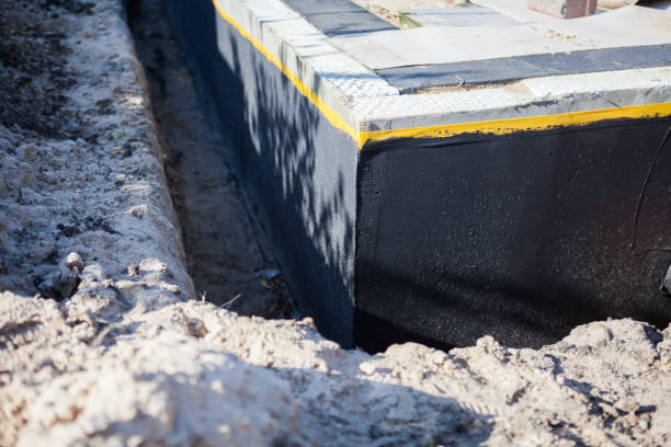 Professional Waterproofing technician working in Dennison, IL